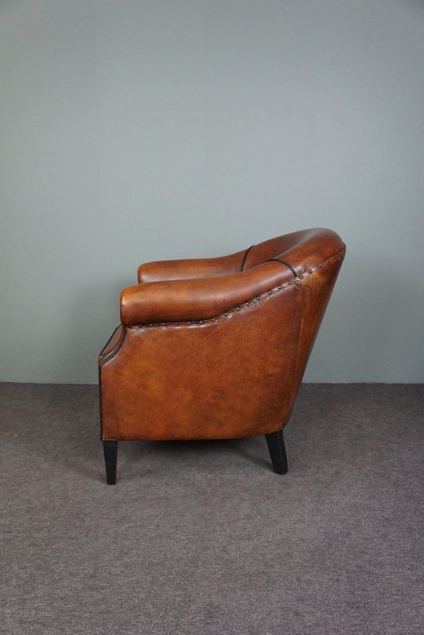 Leather club chair with black piping