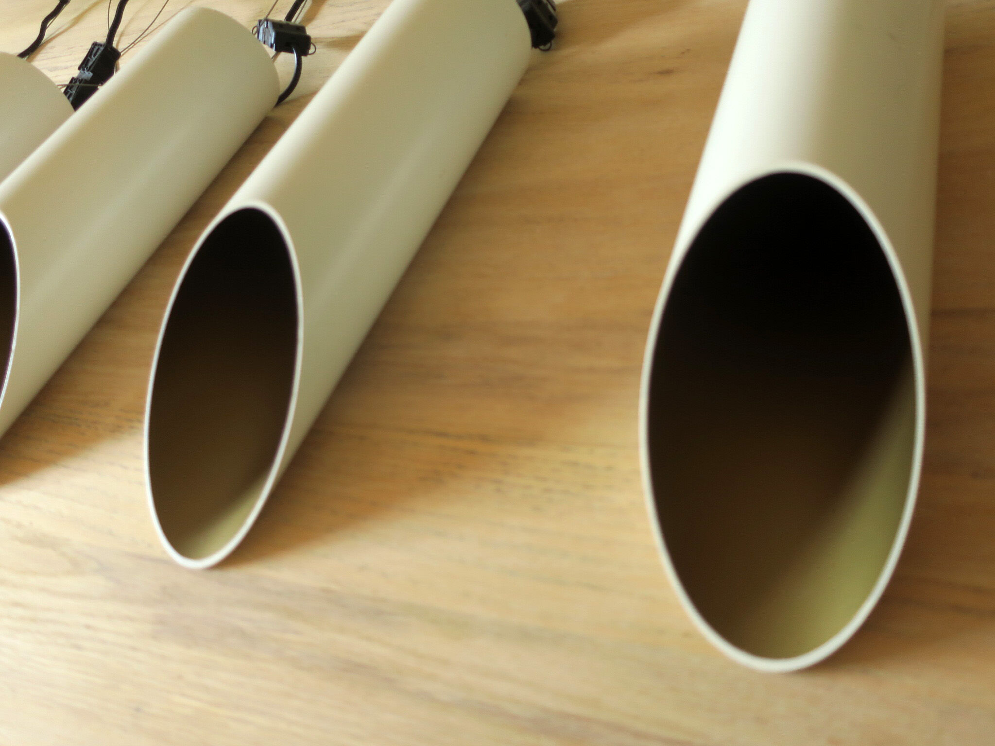 Set of 5 large cylindrical white and gold cinema pendants 1970s