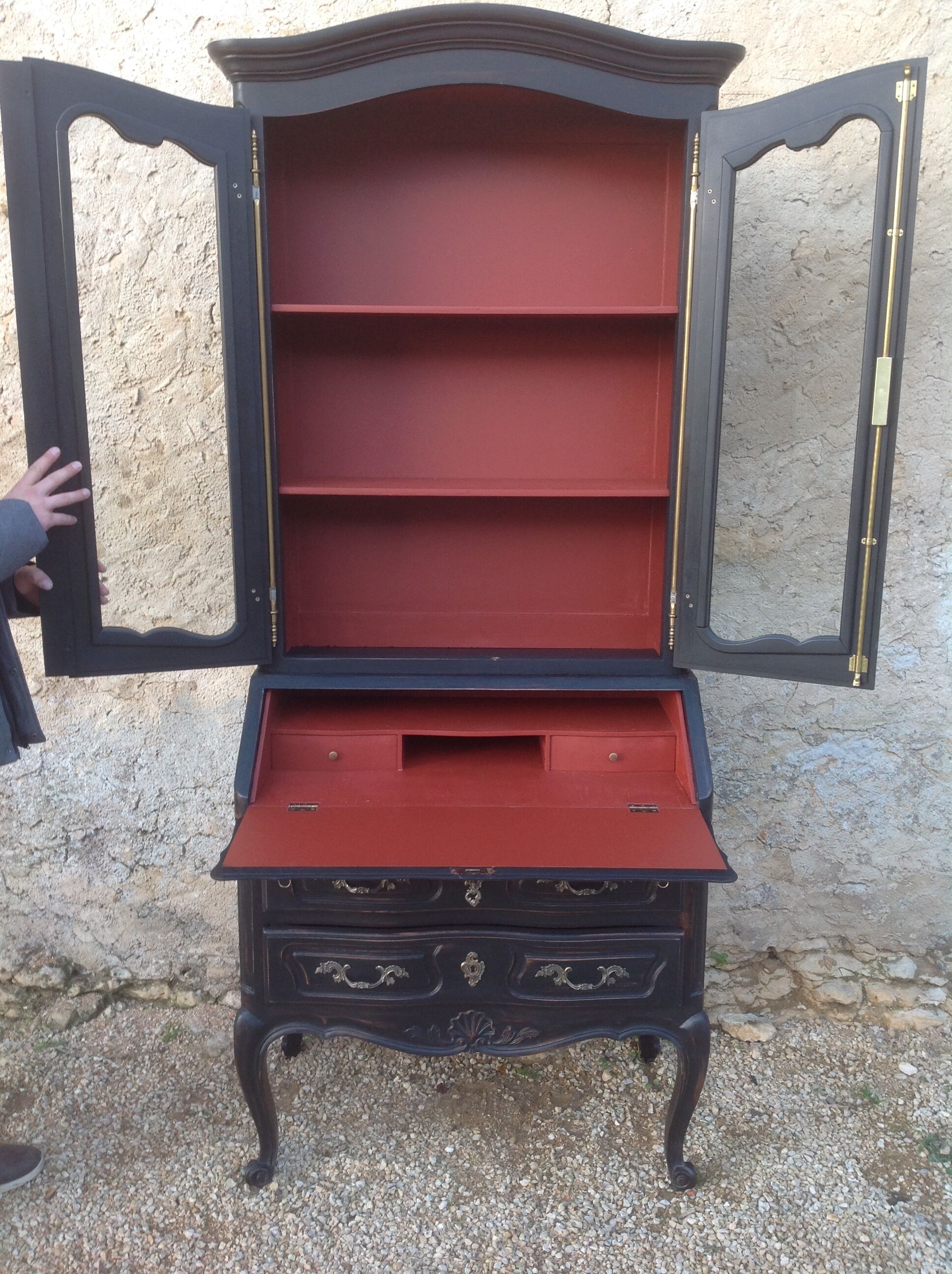 Louis XV style scriban bookcase in black and Basque red patinated cherry wood