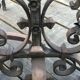 Pair of neo-gothic chenets, art ironwork, with shovel and pliers