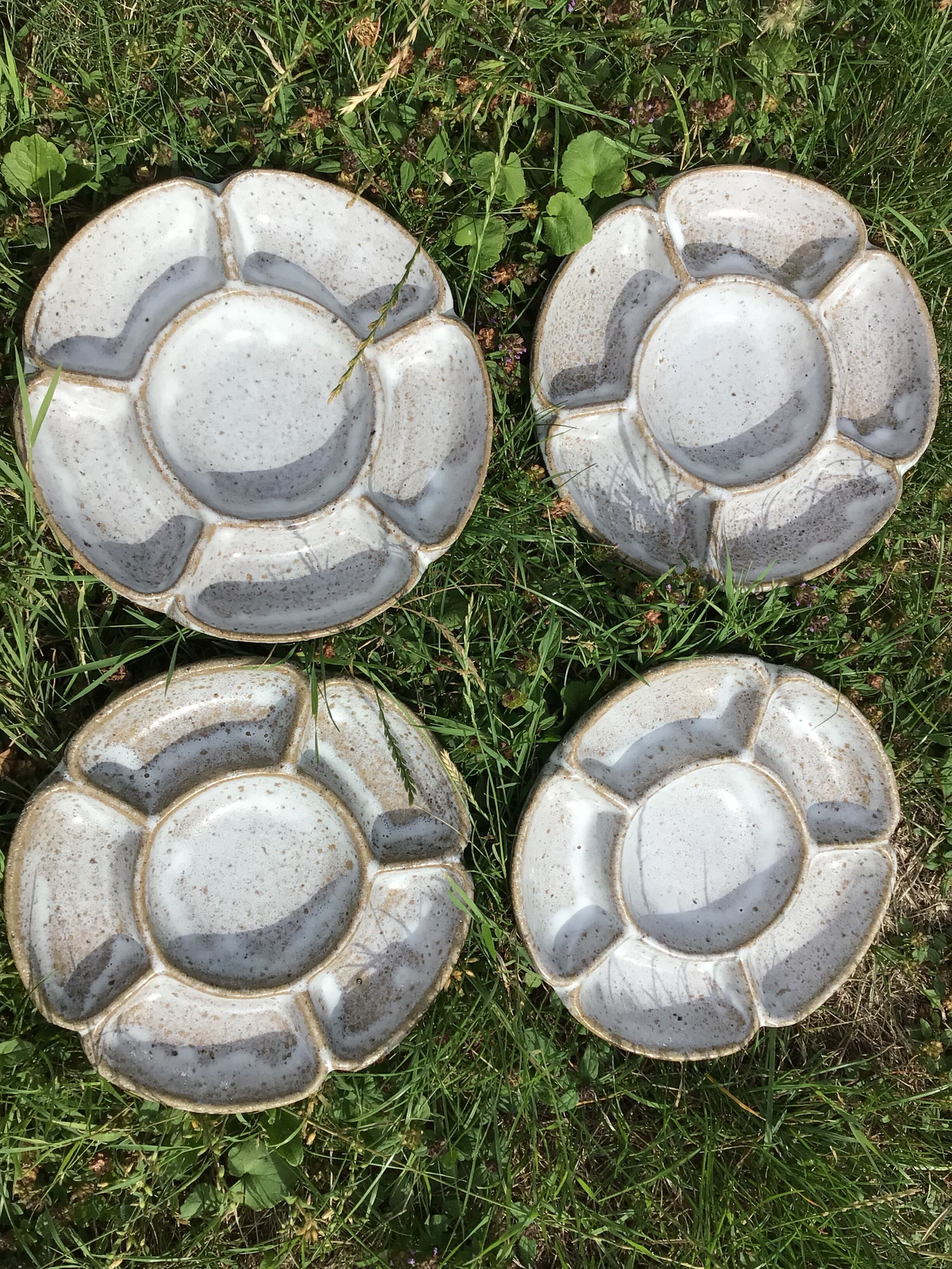 4 White compartmentalized handmade stoneware plates