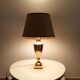 Art deco living room lamp in golden brass from the 1950s