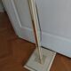 Vintage floor lamp with beige fabric shade and gold legs