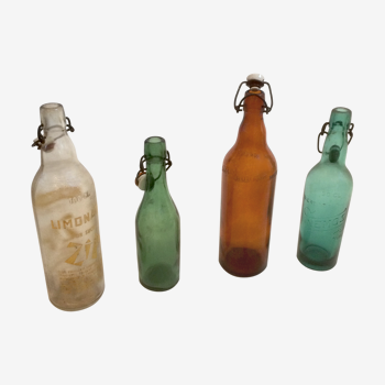 Lot de 4 bouteilles anciennes