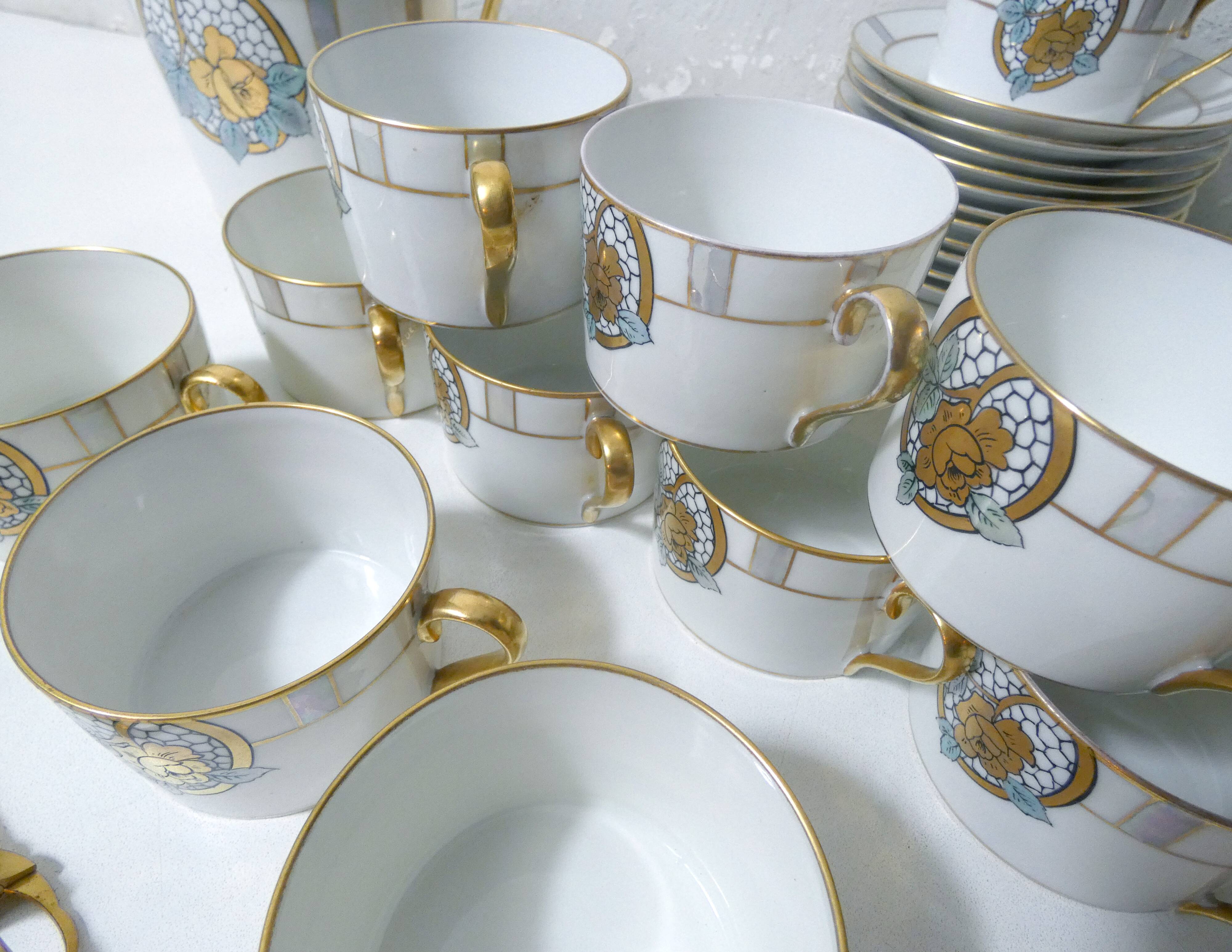 Limoges Ribes porcelain tea and coffee service, gold, silver, iridescent mother-of-pearl, Art Deco