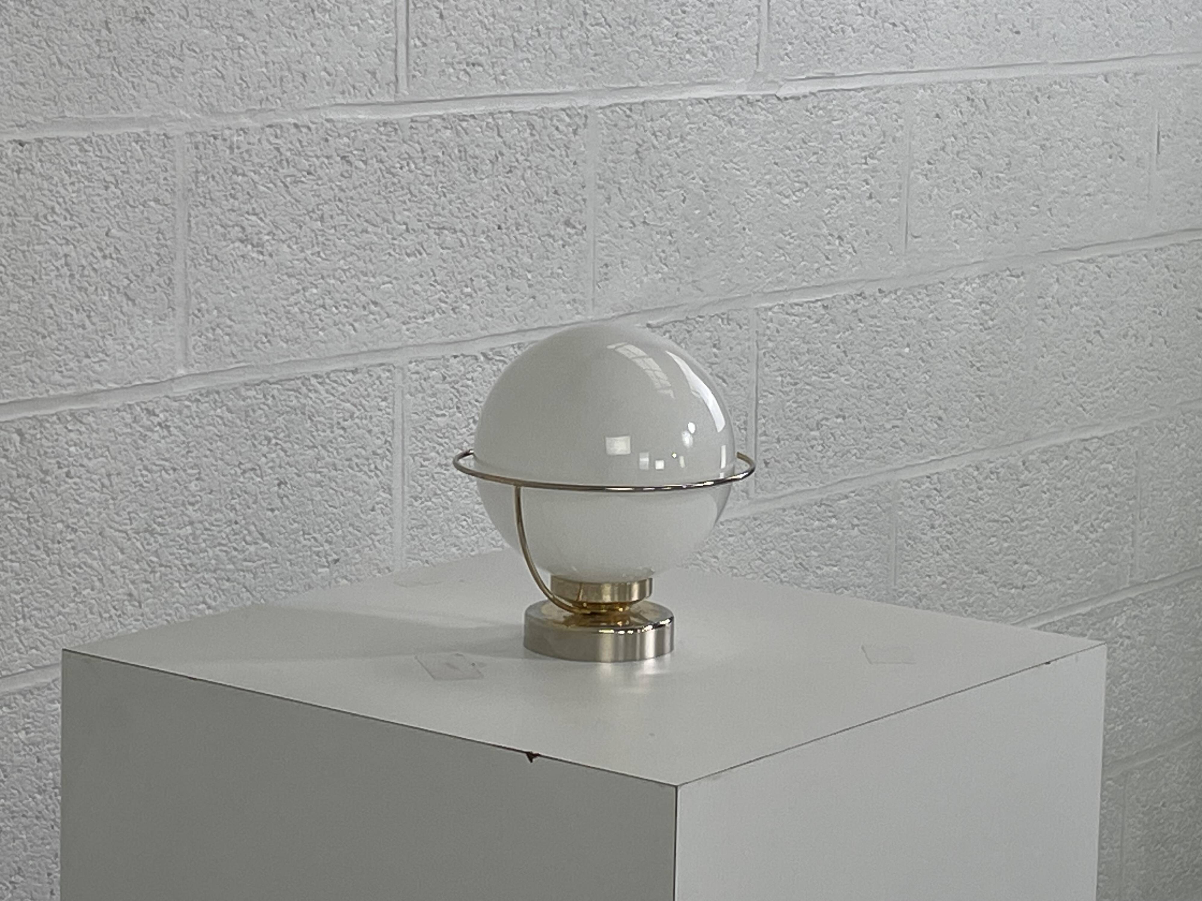 brass wall light from the 50s