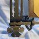 Vintage Art Deco wall-mounted coat and hat rack.