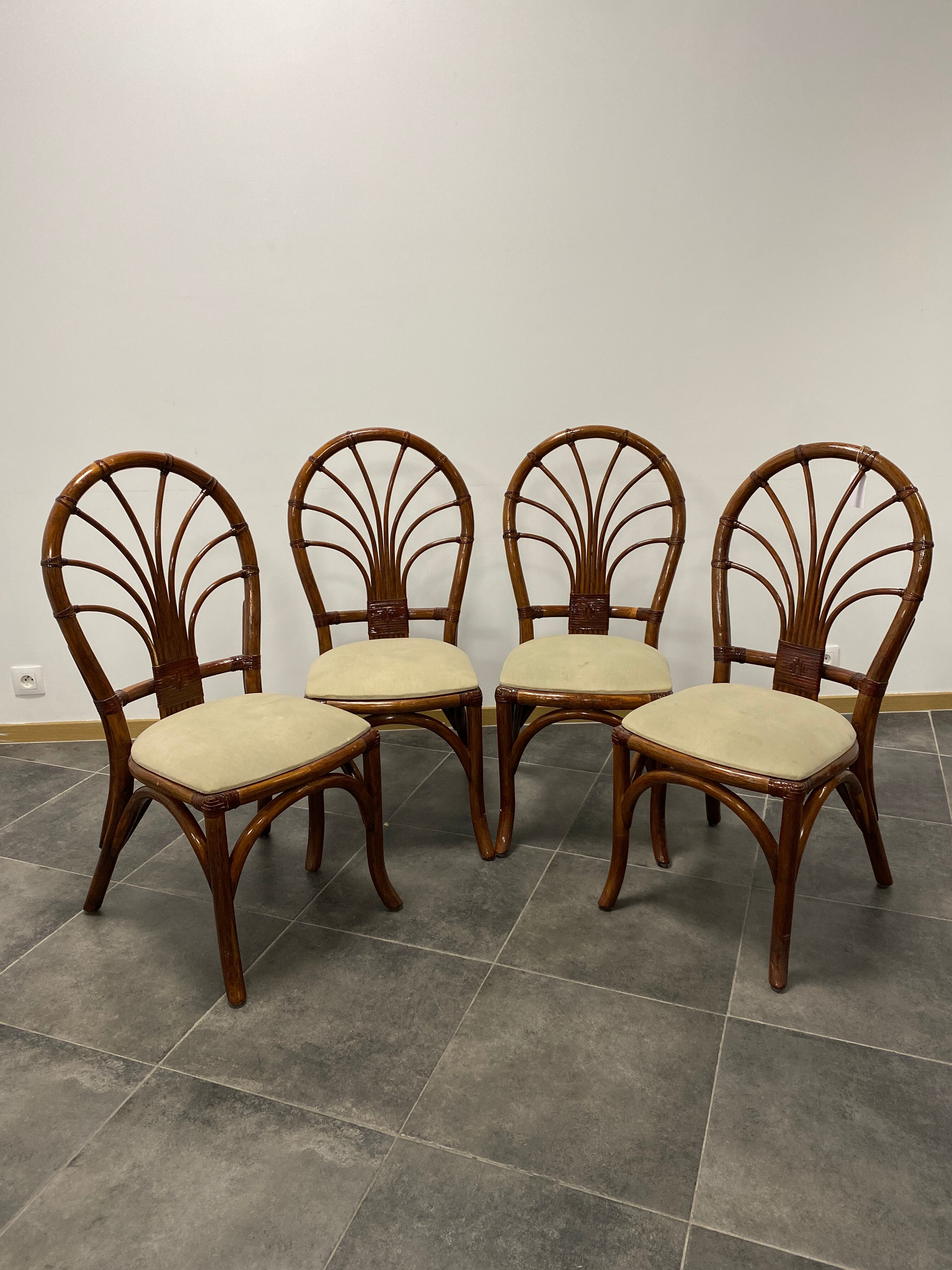 4 vintage woven rattan chairs