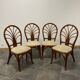 4 vintage woven rattan chairs