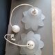 Pair of frosted glass flower pendant lights