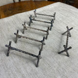 Six bamboo-patterned metal silver-plated knife rests.