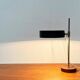 Mid-century minimalist table lamp with a teak veneer base, 1960s.