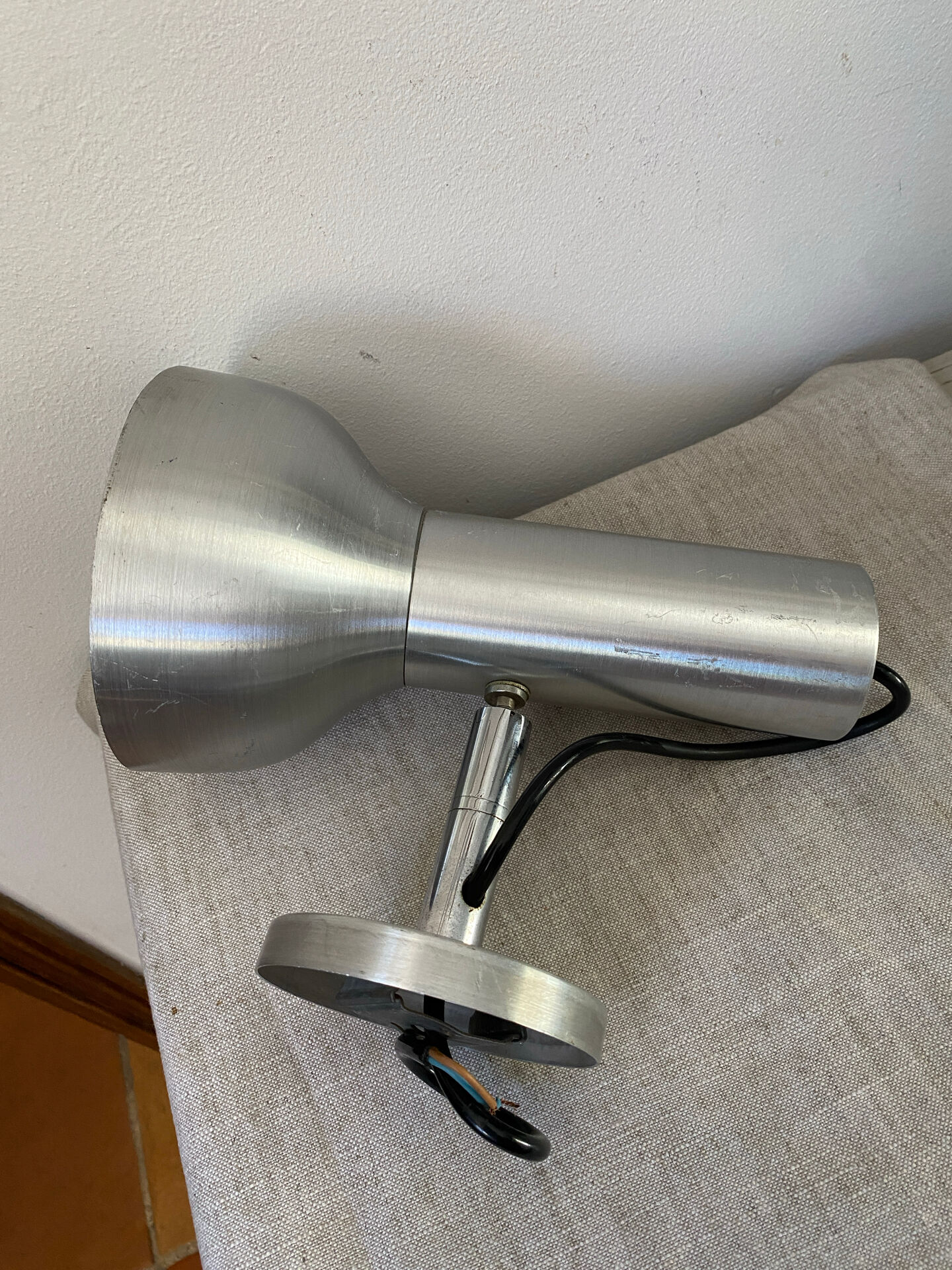 Pair of brushed metal wall sconces