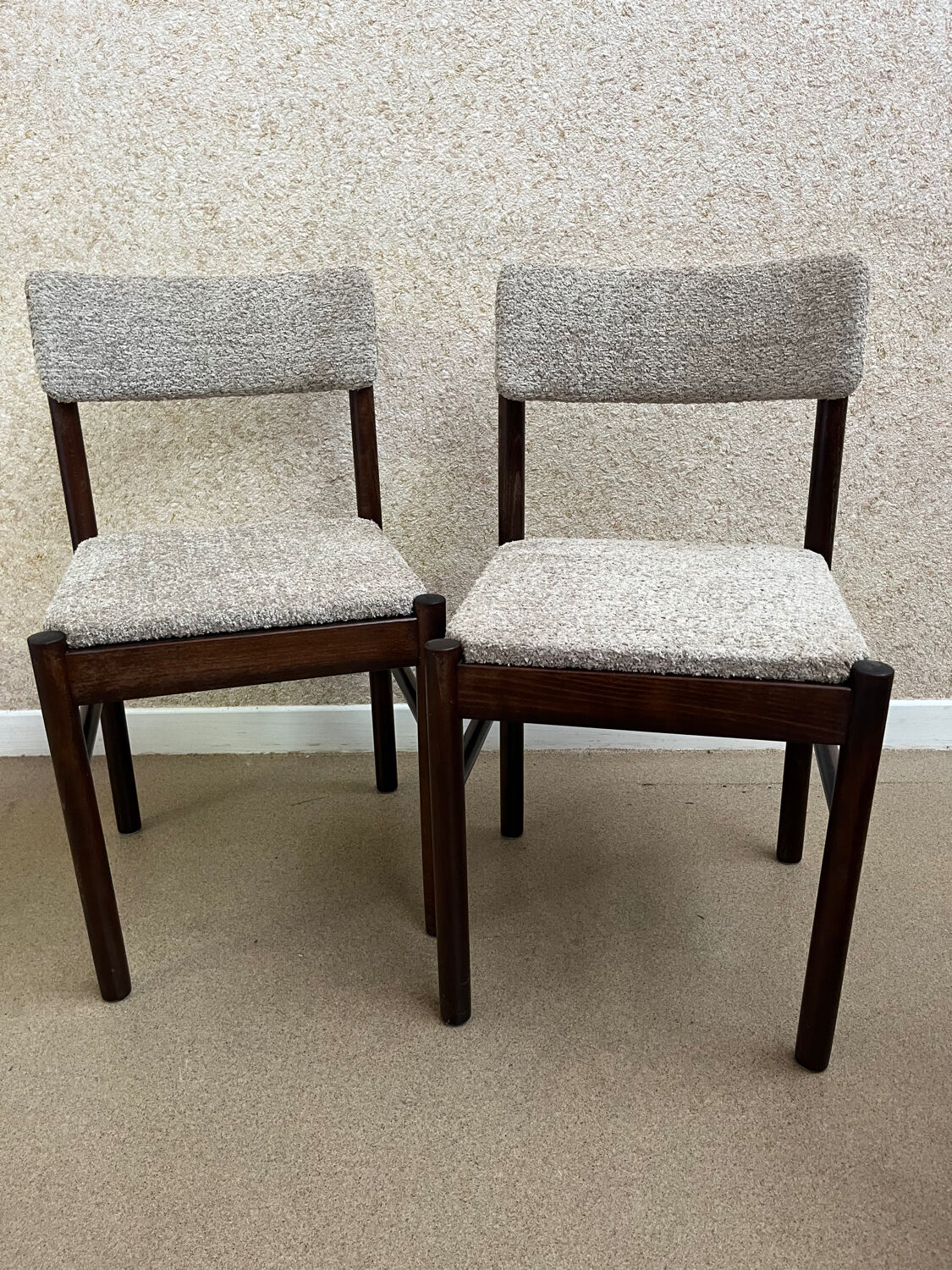 Pair of wooden chairs in loop fabric