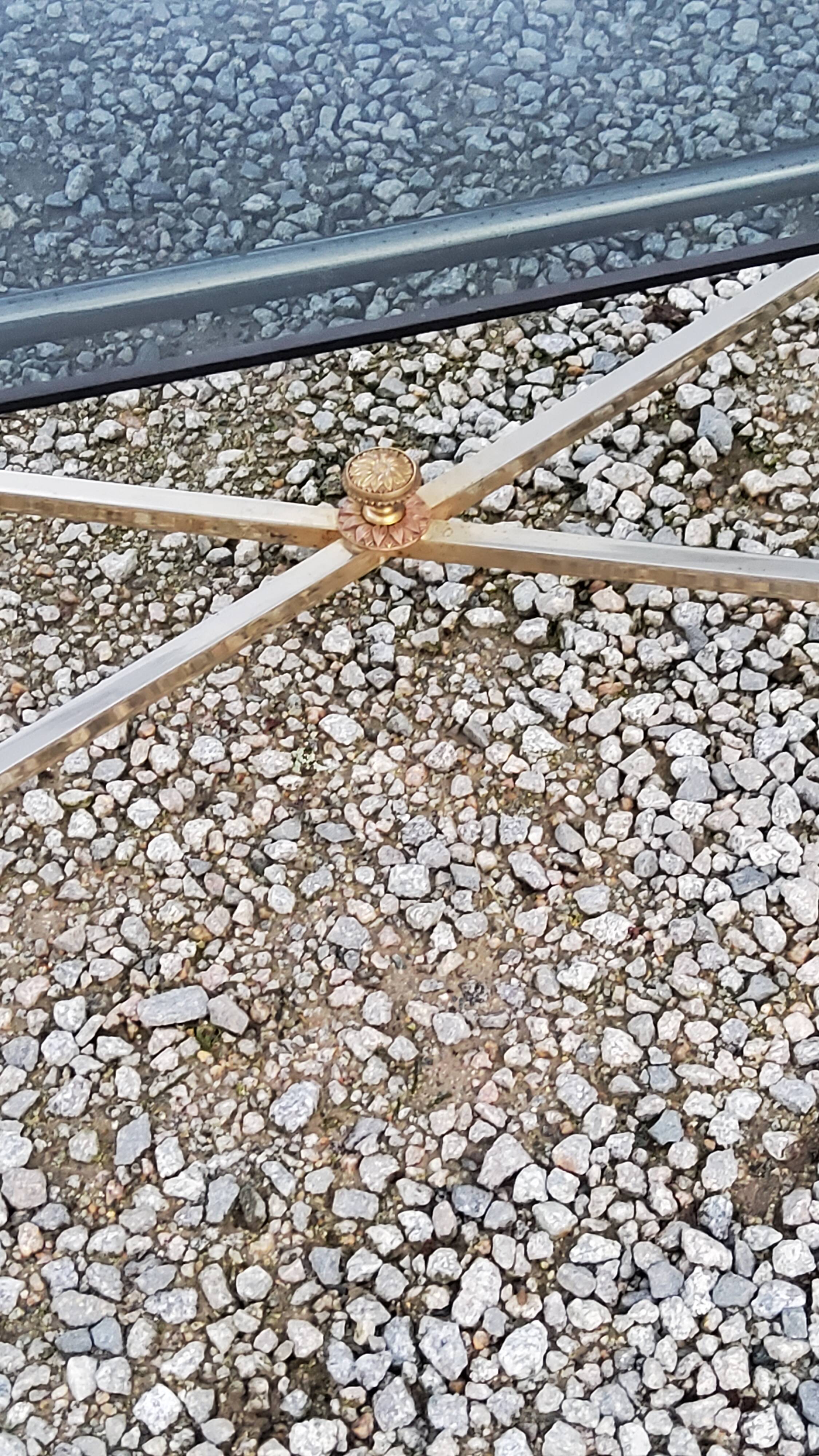 Coffee table of the 70s in neo-classical style gilded metal base and chrome smoked glass top