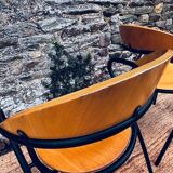 Pair of wooden and black metal chairs