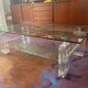 Coffee table made of glass and plexiglass.