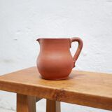 Vintage terracotta pitcher