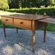 Old farmhouse table louis Philippe style in solid cherry with turned feet.