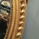 Oval mirror with wooden pediment and gilded stucco oval ice beveled Napoleon III - 80x120cm