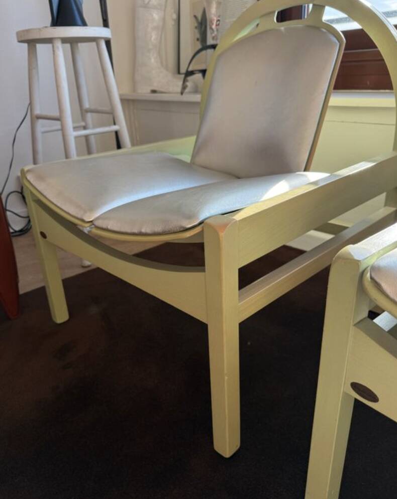 Pair of Argos armchairs by Baumann in green and silver leather.