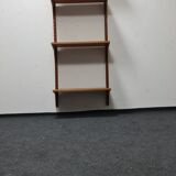 Vintage teak wall system by Poul Cadovious