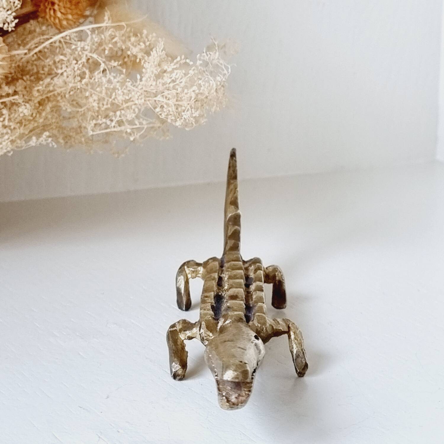 Stylized brass crocodile