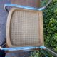 Wooden chair with caning in the style of Marcel Breuer.