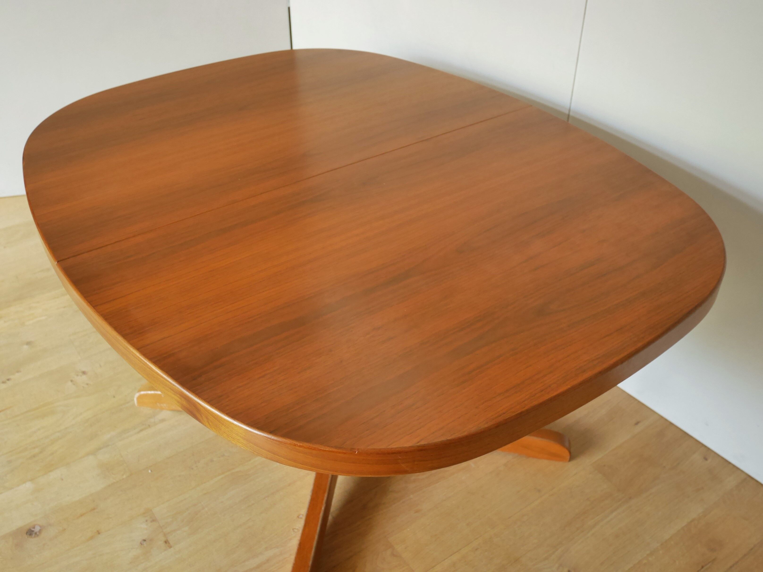 Baumann oval walnut table with extension cords