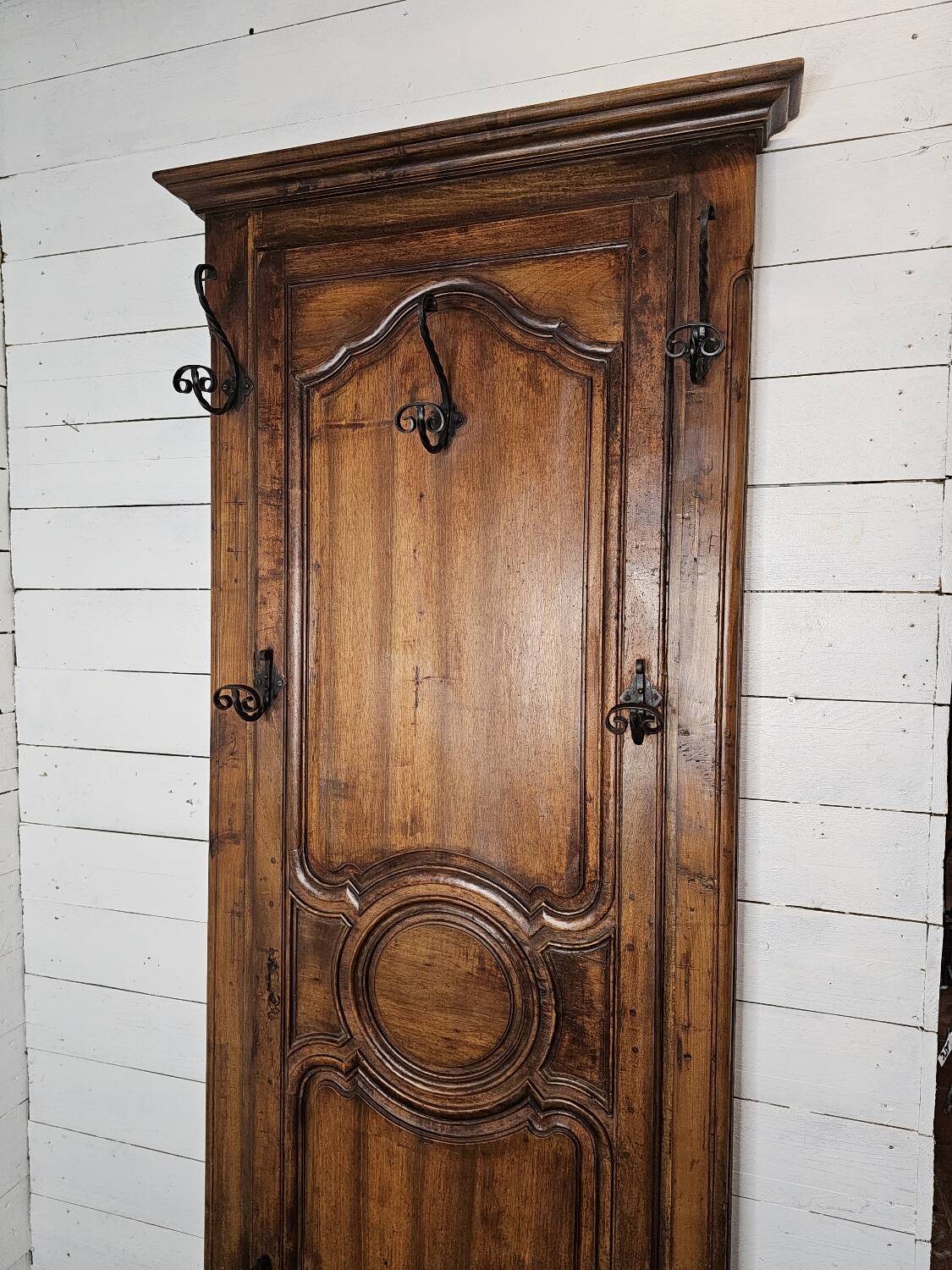 Wall-mounted locker in walnut
