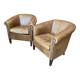pair of camel leather club armchairs