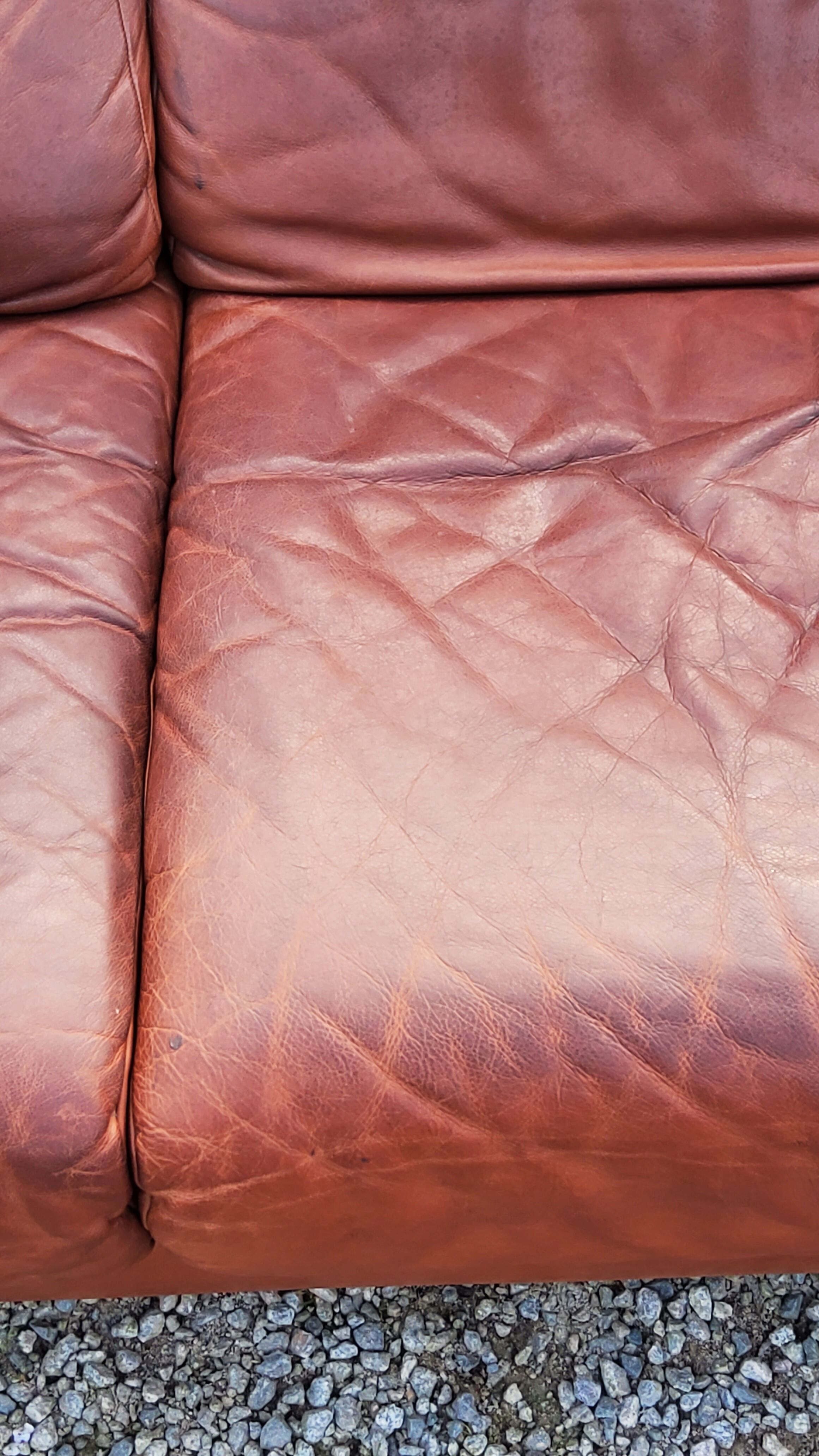 Pair of armchairs and De Sede sofa in cognac leather from the 70s/80s