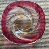 Empty pocket in pink tinted glass