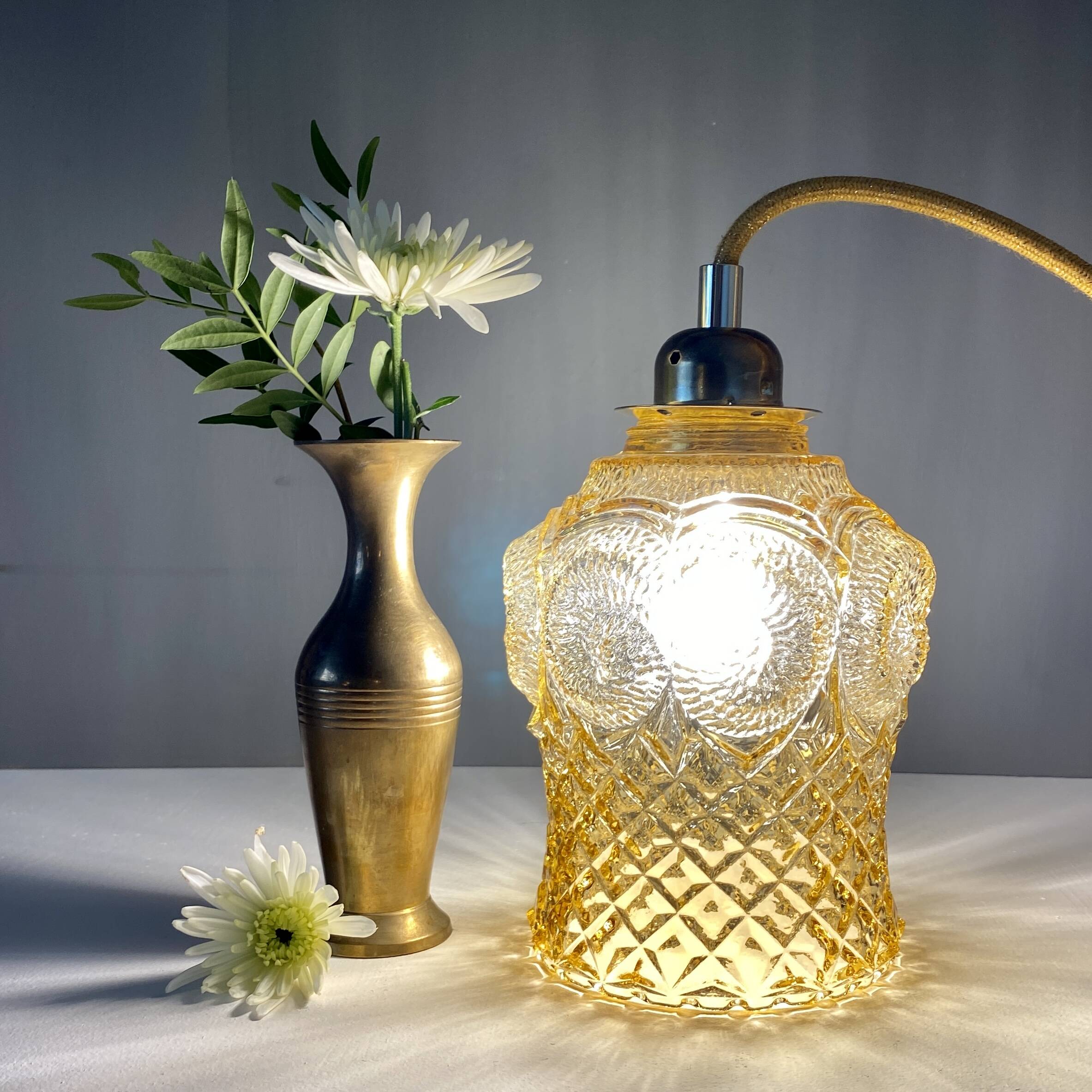Bladeuse tulipe vintage en verre ambré