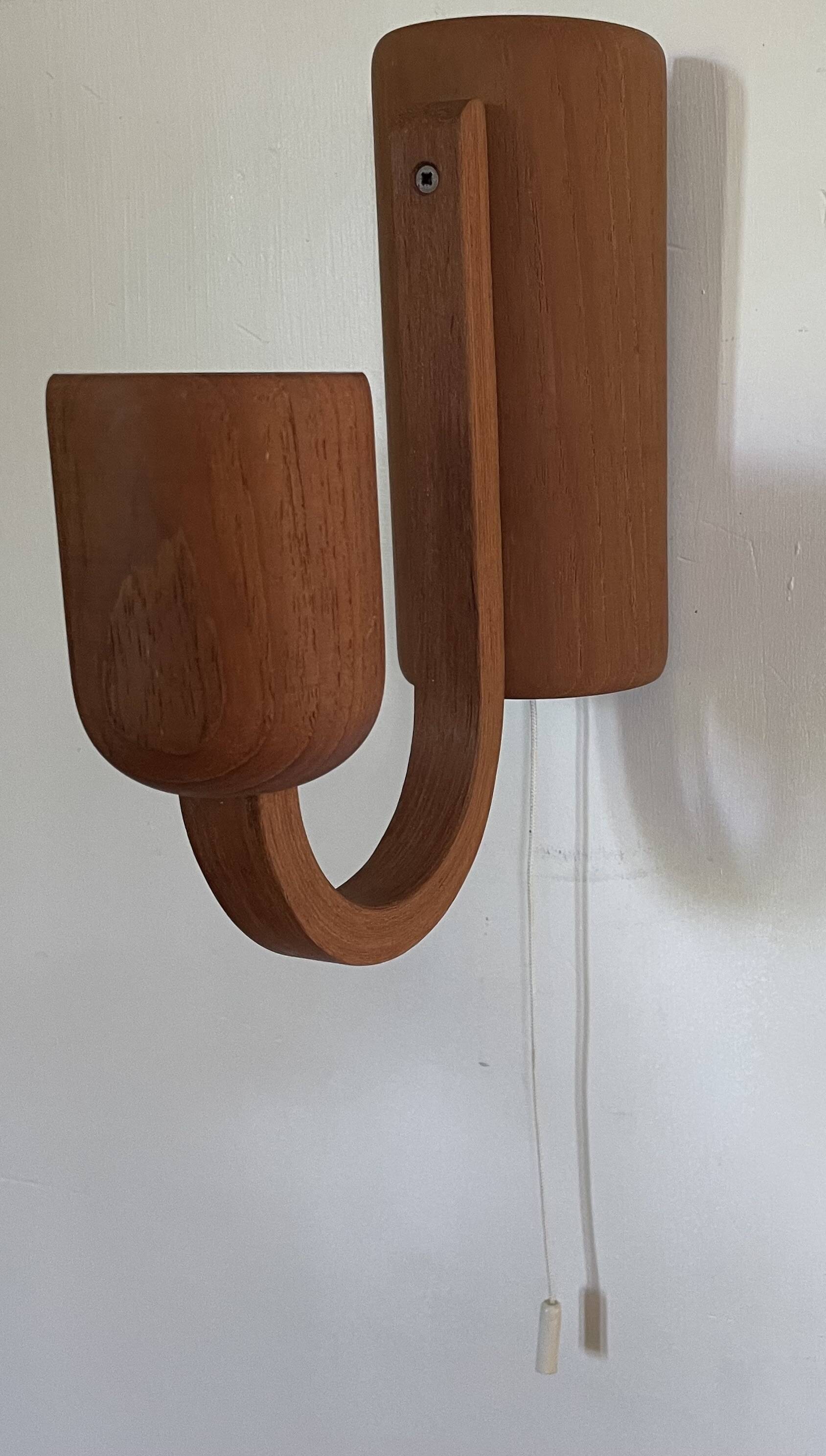 Pair of Scandinavian teak wall lights, Dolmus, 70s
