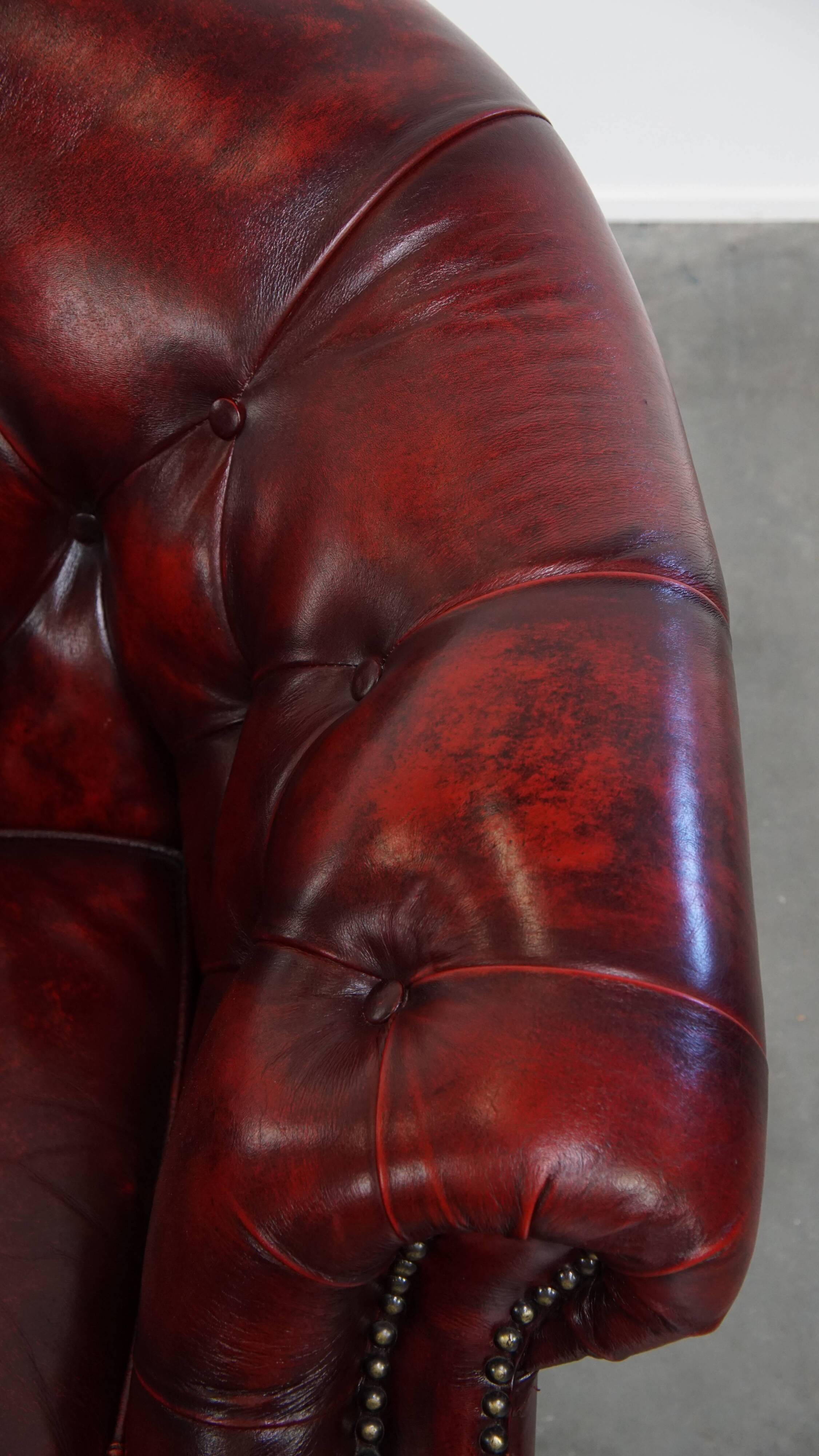 Set of a Red Cowhide Leather Chesterfield Club Chair and Side Table