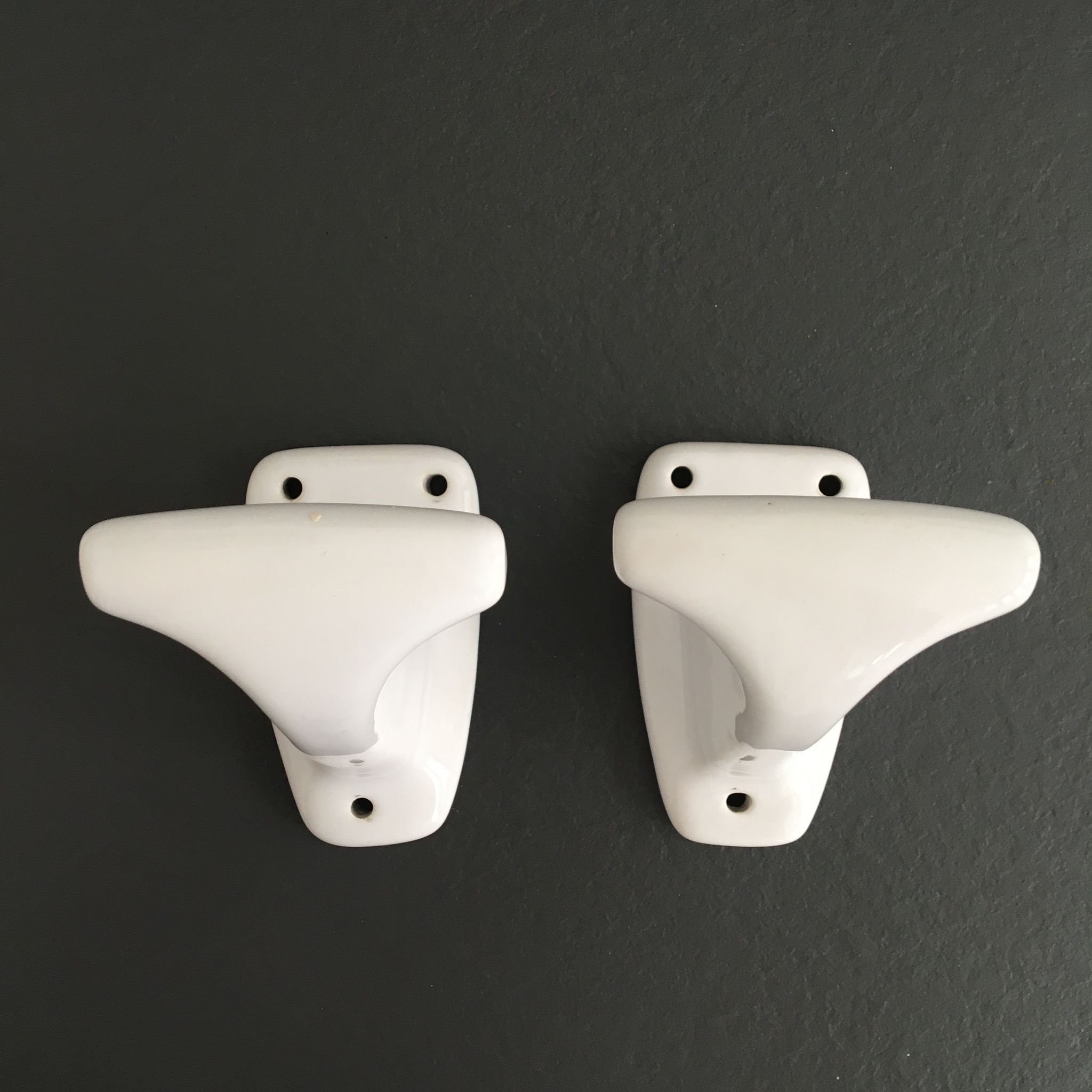 Pair of retro white porcelain hooks