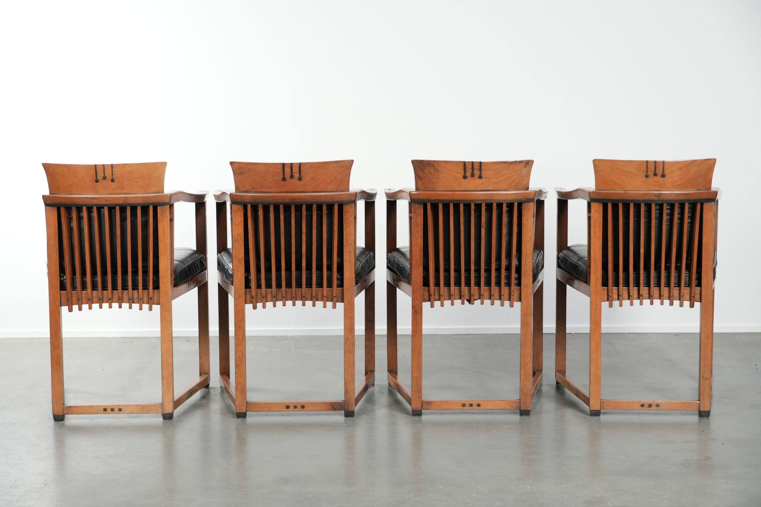 Black leather set of 4 Art Deco design dining chairs with armrests