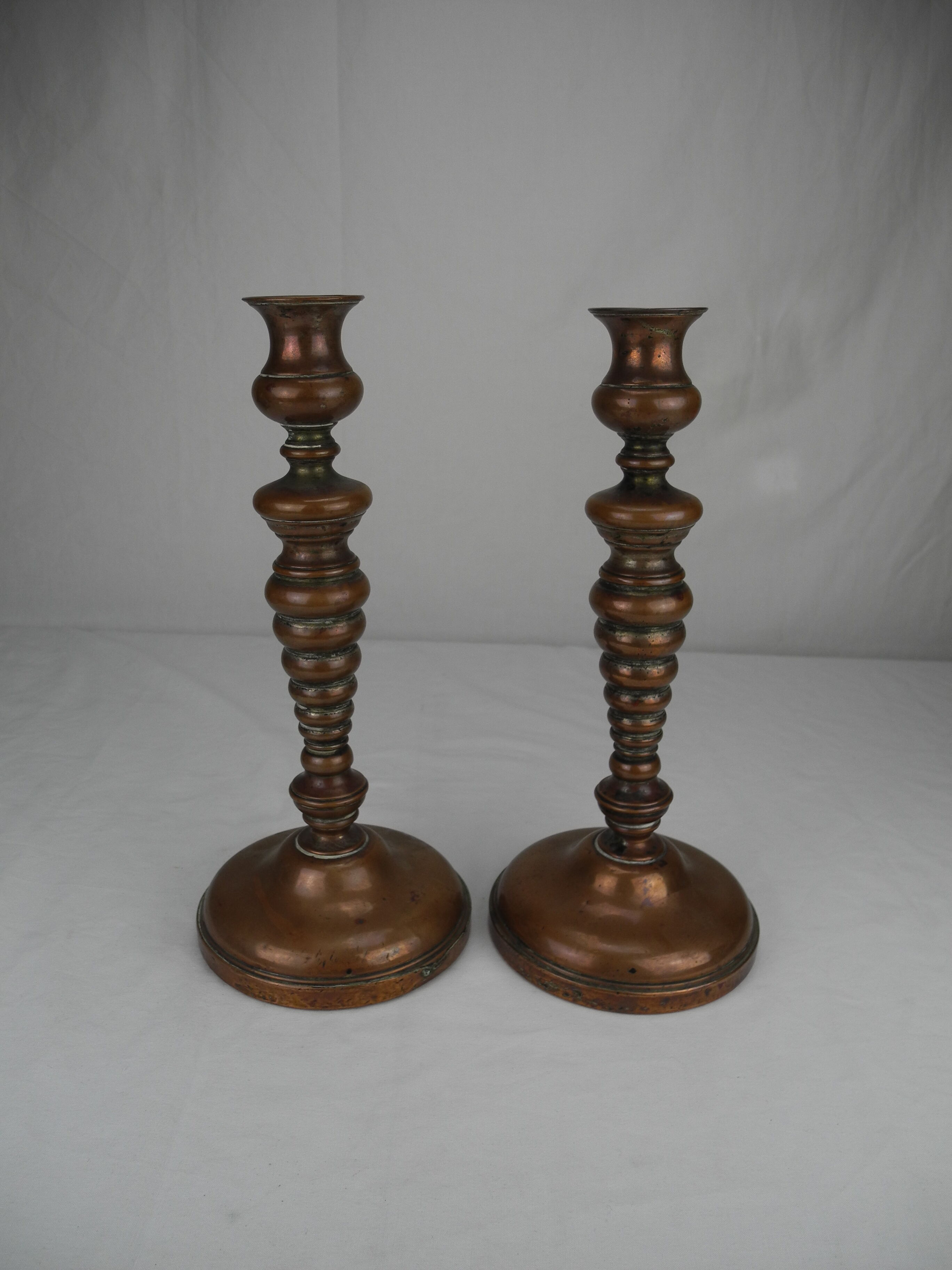 Pair of French copper candlesticks, 19th century