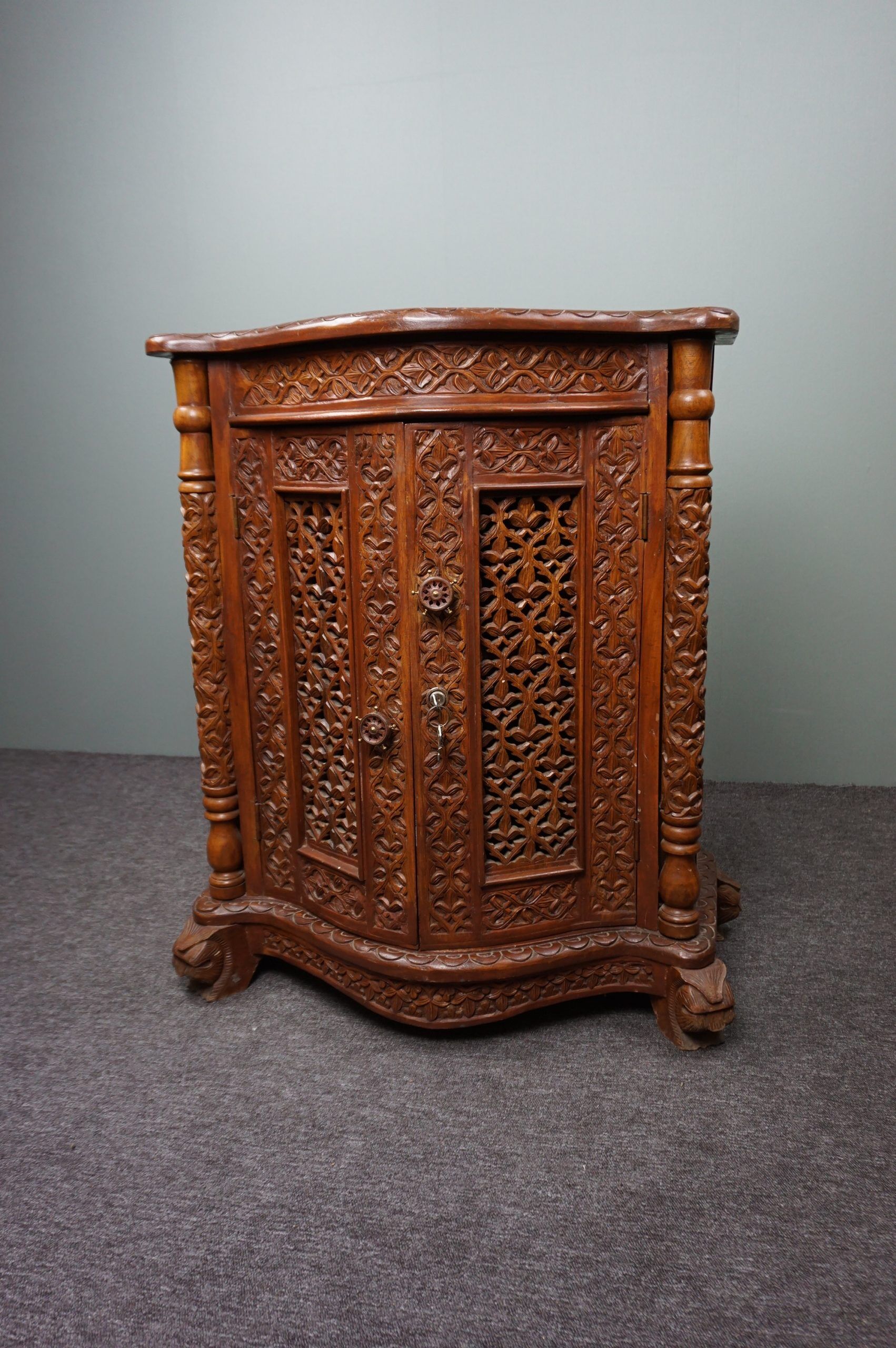 Carved wooden cabinet from the mid-20th century