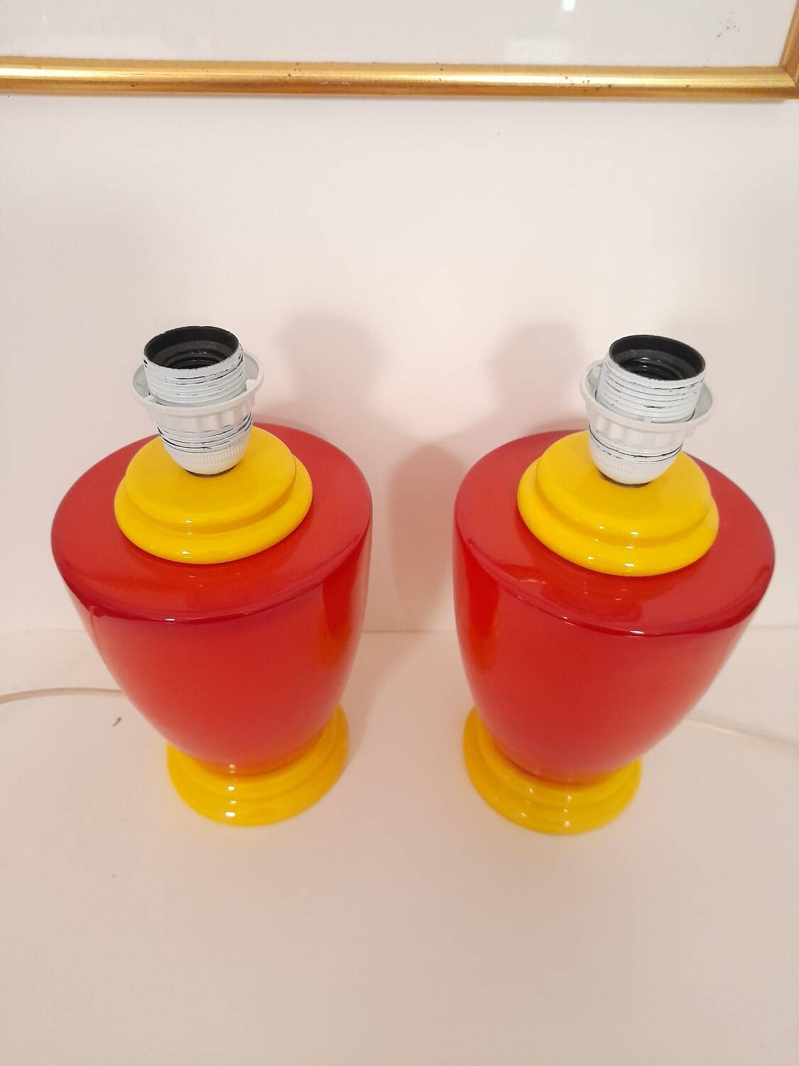 Pair of red and yellow lamp bases from the 80s