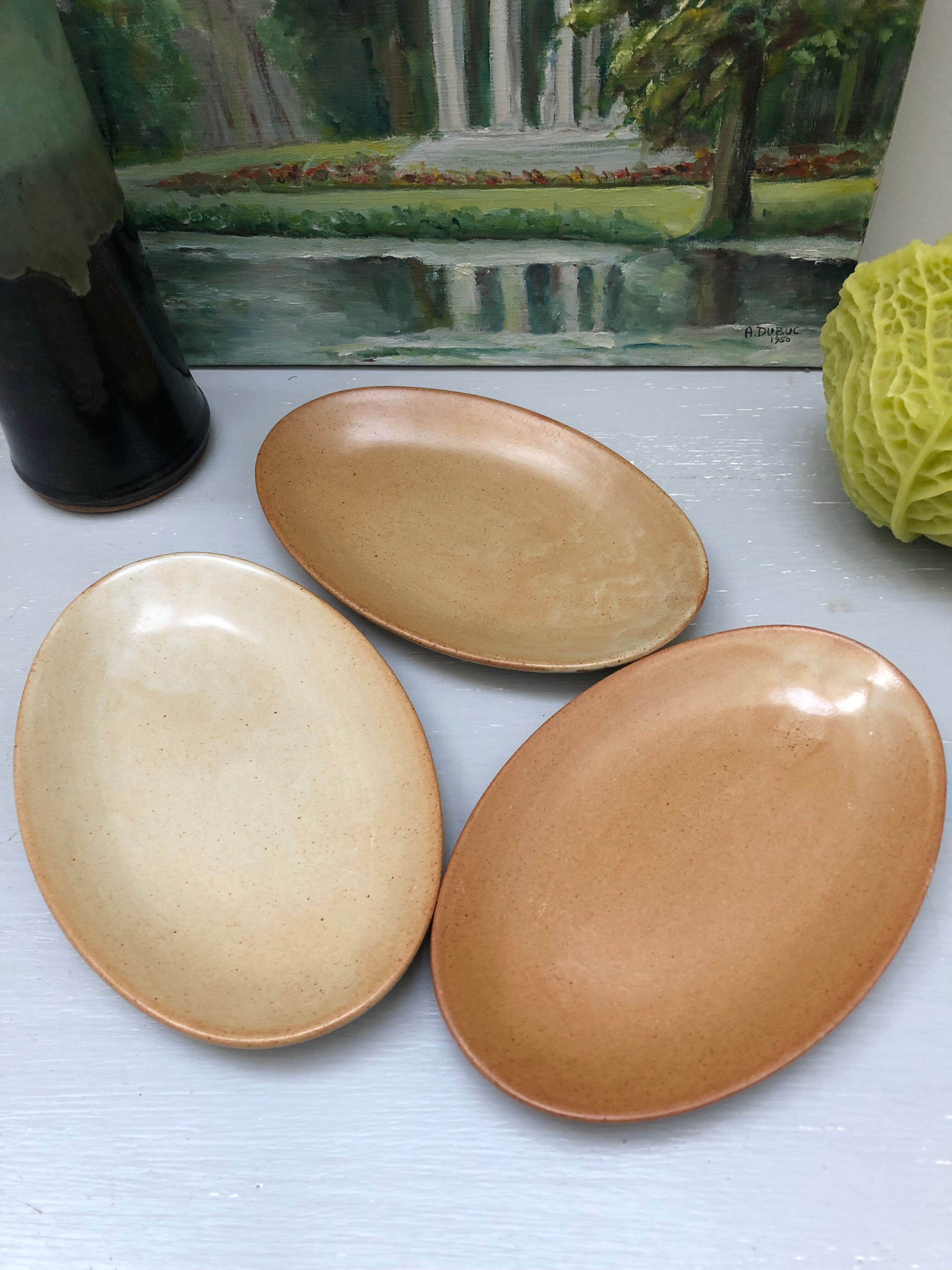 Set of three stoneware dishes village france