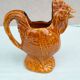 Rooster pitcher