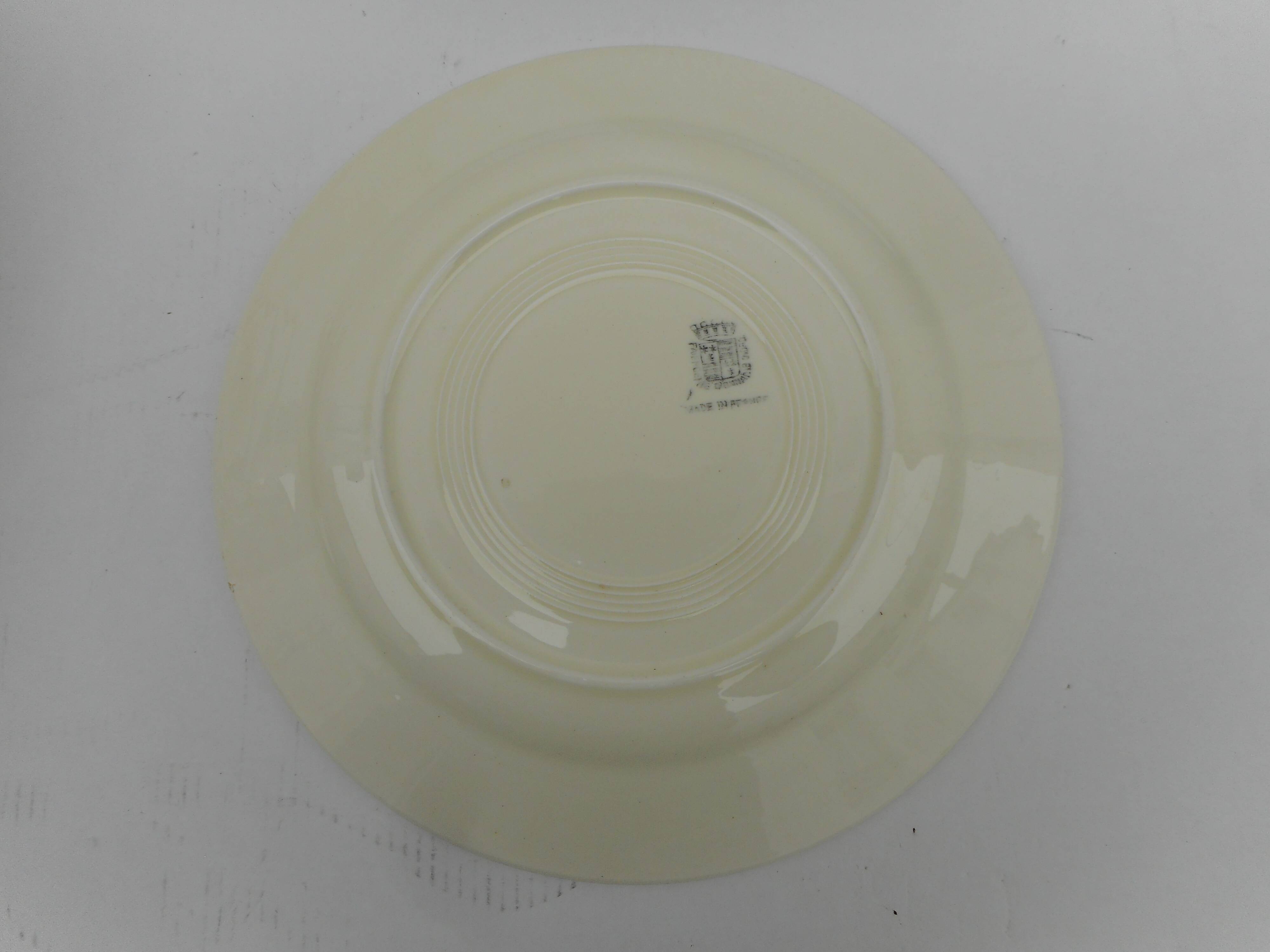 Six flat earthenware plates