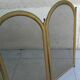 Neoclassical style fire screen with 4 panels and mesh.
