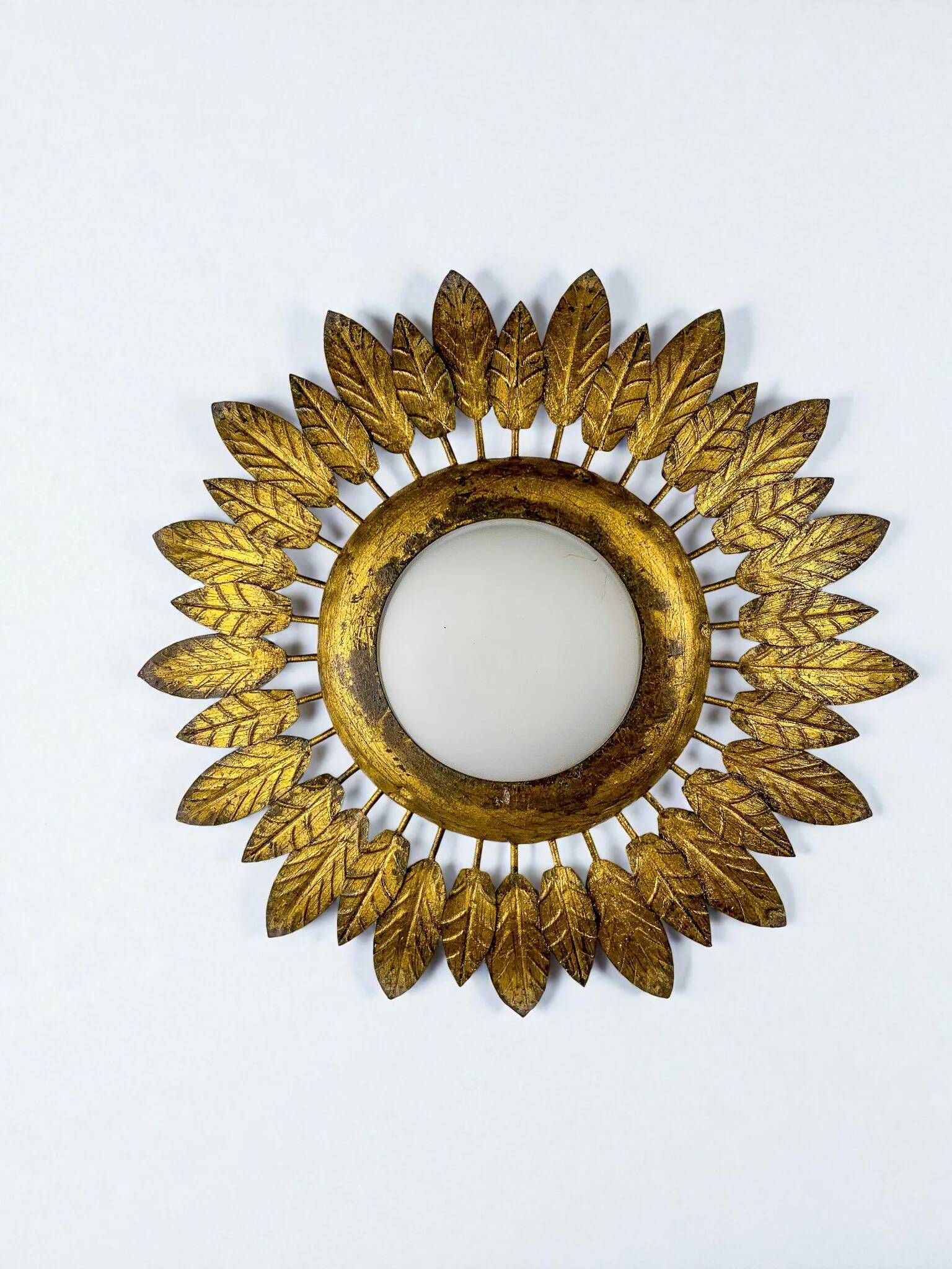 Spanish sunburst ceiling light – opaline glass & gilt iron foliage, 1960s