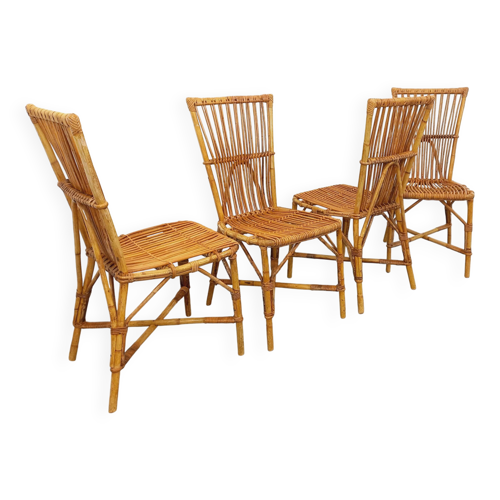 Set of 4 vintage Audoux Minet rattan chairs from the 1950s and 60s.