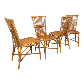 Set of 4 vintage Audoux Minet rattan chairs from the 1950s and 60s.