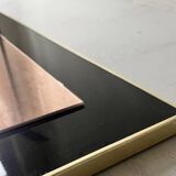 Large brass mirror and pink glass circa 1970