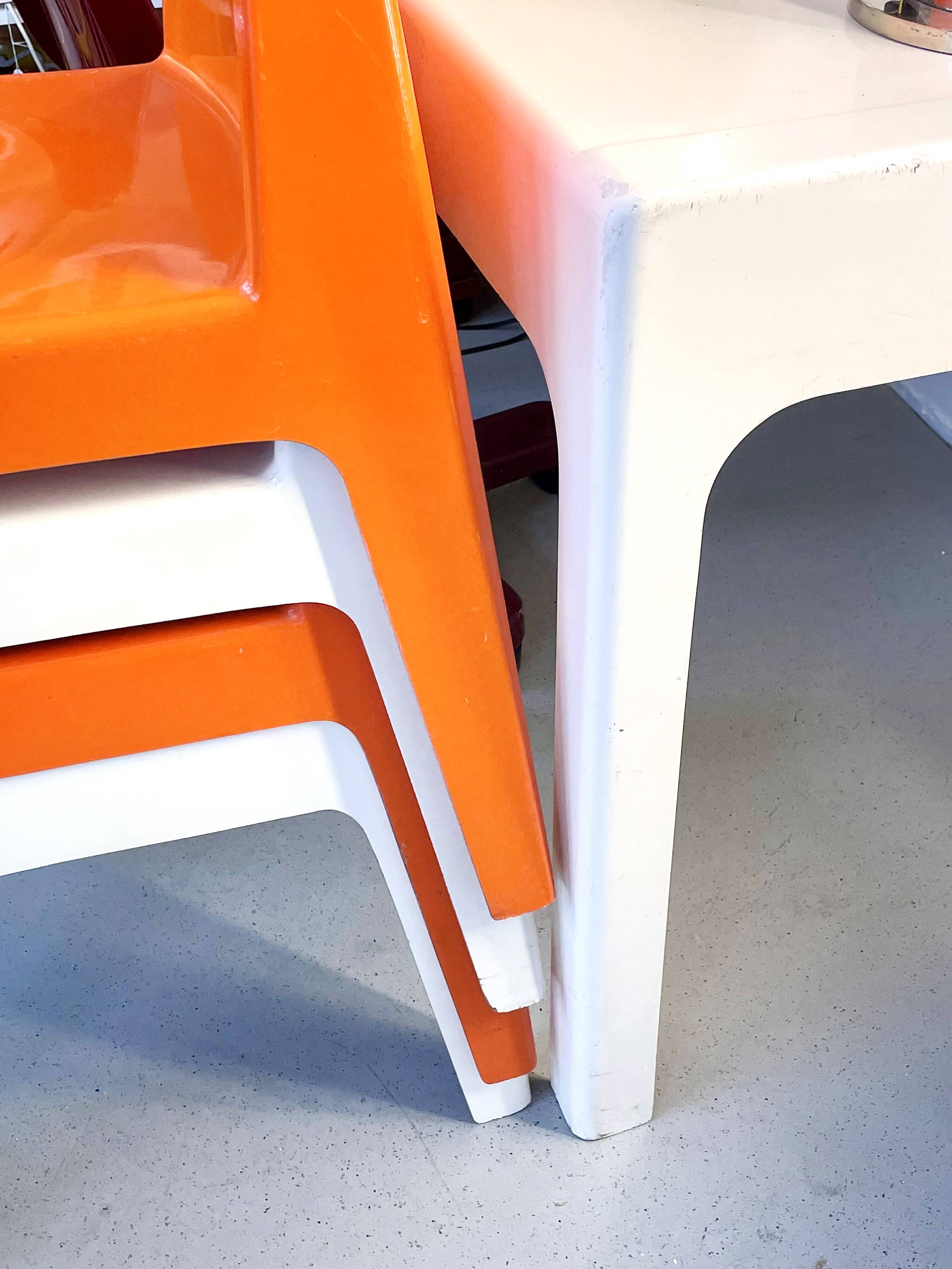 Two white fiberglass Kostka chairs 1970